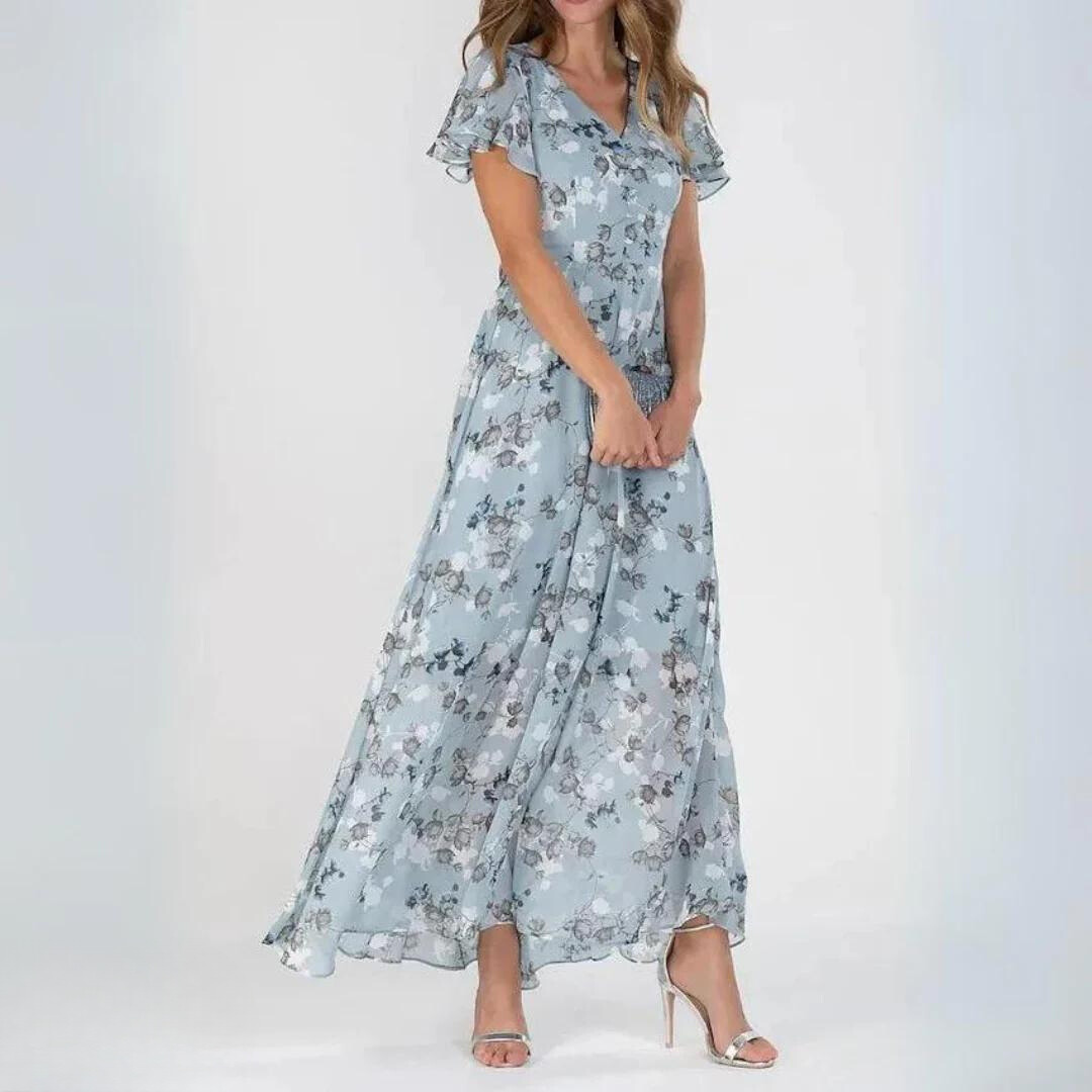 Elegant women's V-neck sleeveless maxi dress for party wear. Perfect flowing evening gown with a chic summer style.