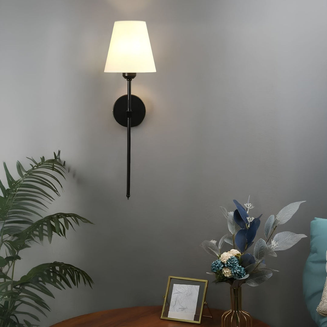 Designer cordless LED wall light, rechargeable, offering customizable 16-color ambient illumination.