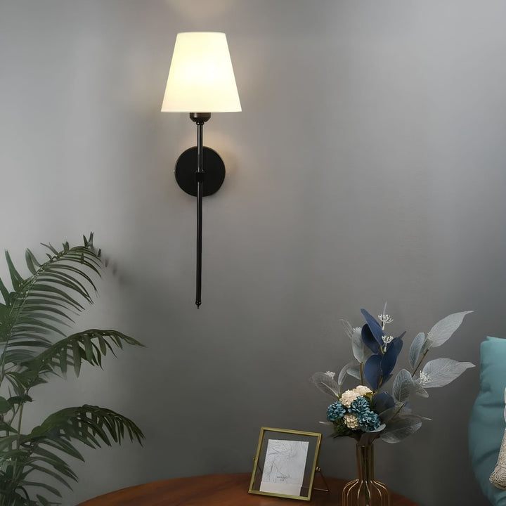 Designer cordless LED wall light, rechargeable, offering customizable 16-color ambient illumination.