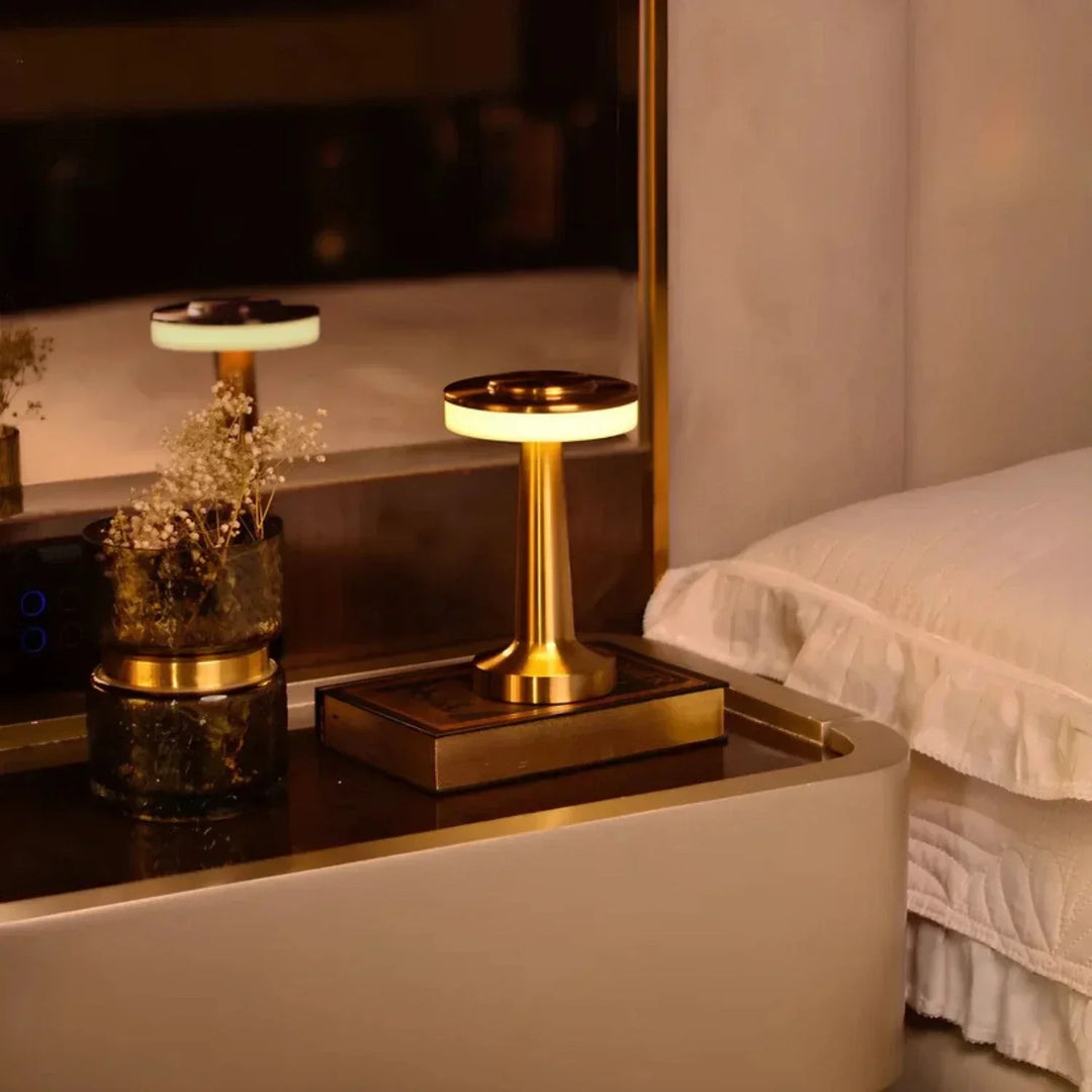 Dimmable LED retro bar lamp. Cordless, metallic, and rechargeable, perfect modern vintage accent lighting.