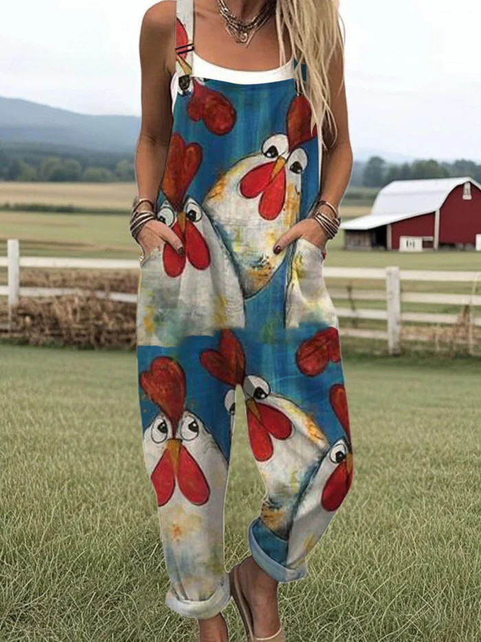 Women's playful chicken print dungarees, multicoloured sleeveless jumpsuit, comfortable casual summer one-piece.