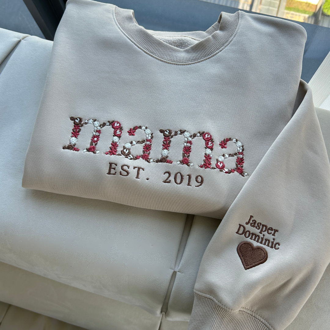 Unisex custom floral sweatshirt, a personalized Mother's Day gift for mom, featuring unique embroidered flowers.