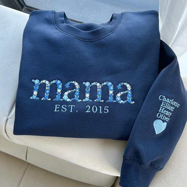 Close-up of custom floral embroidered sweatshirt, a beautiful and unique Mother's Day present for mom or any loved one.