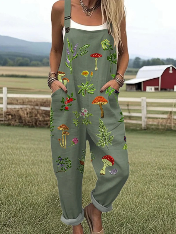 Dark green women's embroidered jumpsuit with nature-inspired floral botanical print. Elegant & comfortable dungarees.