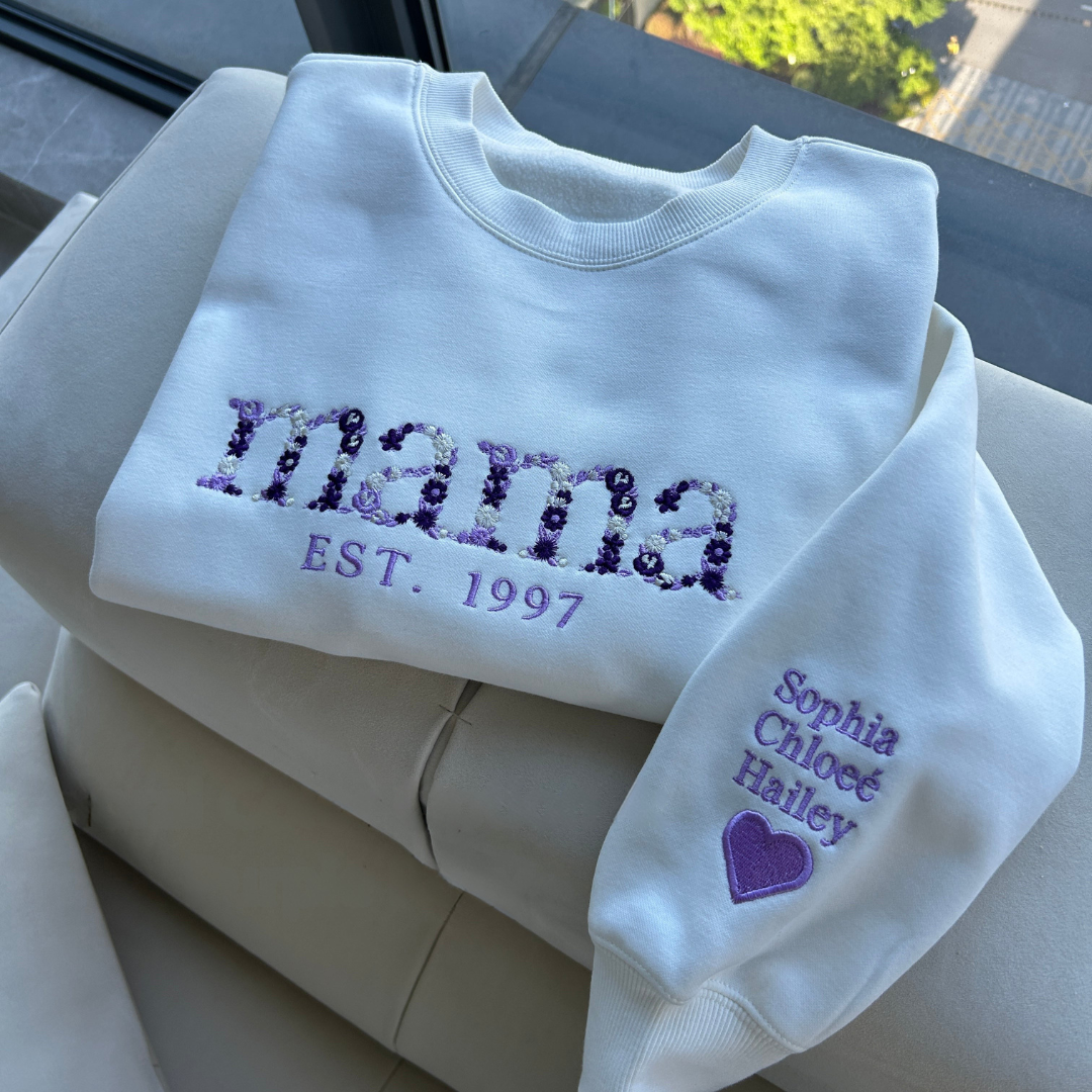 Stylish unisex custom floral sweatshirt, an embroidered top and personalized Mother's Day gift for men's and women's clothing.