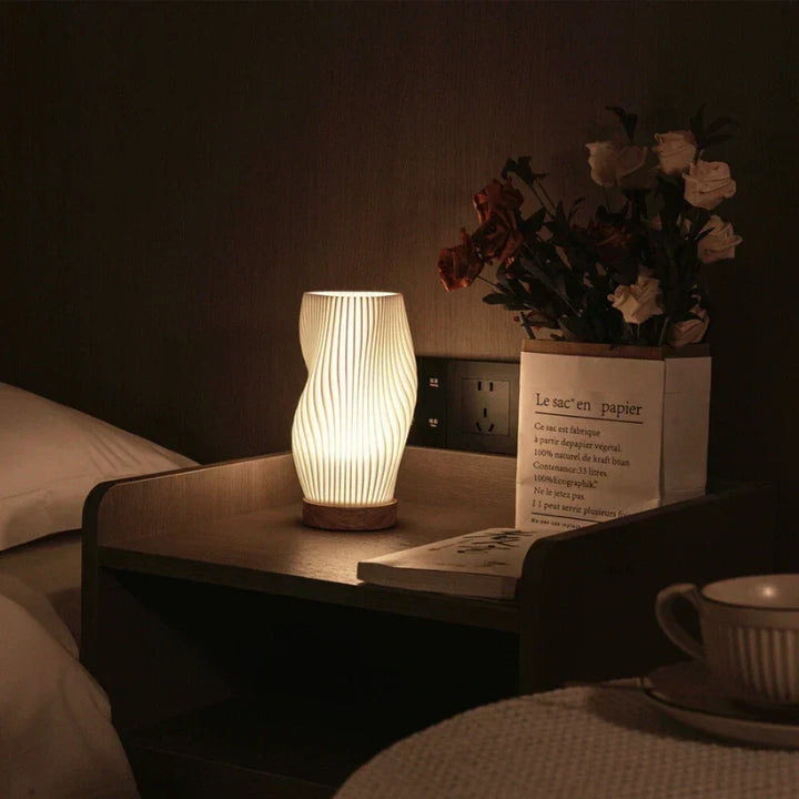 Modern Sculpted Wavecrest lamp by Nvroome, USB compatible for versatile placement.