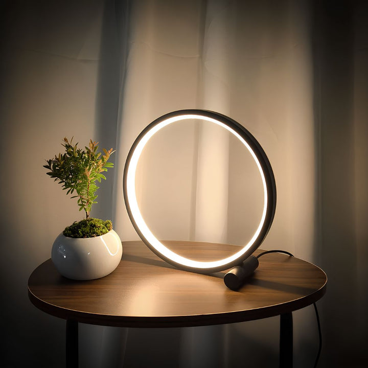 Modern halo ring LED nightstand lamp by Nvroome Lights, dimmable ambient lighting for bedroom & living room.