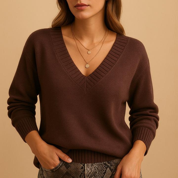 Women's relaxed fit v-neck sweater. Cozy long sleeve knit top, perfect for casual everyday wear or office.