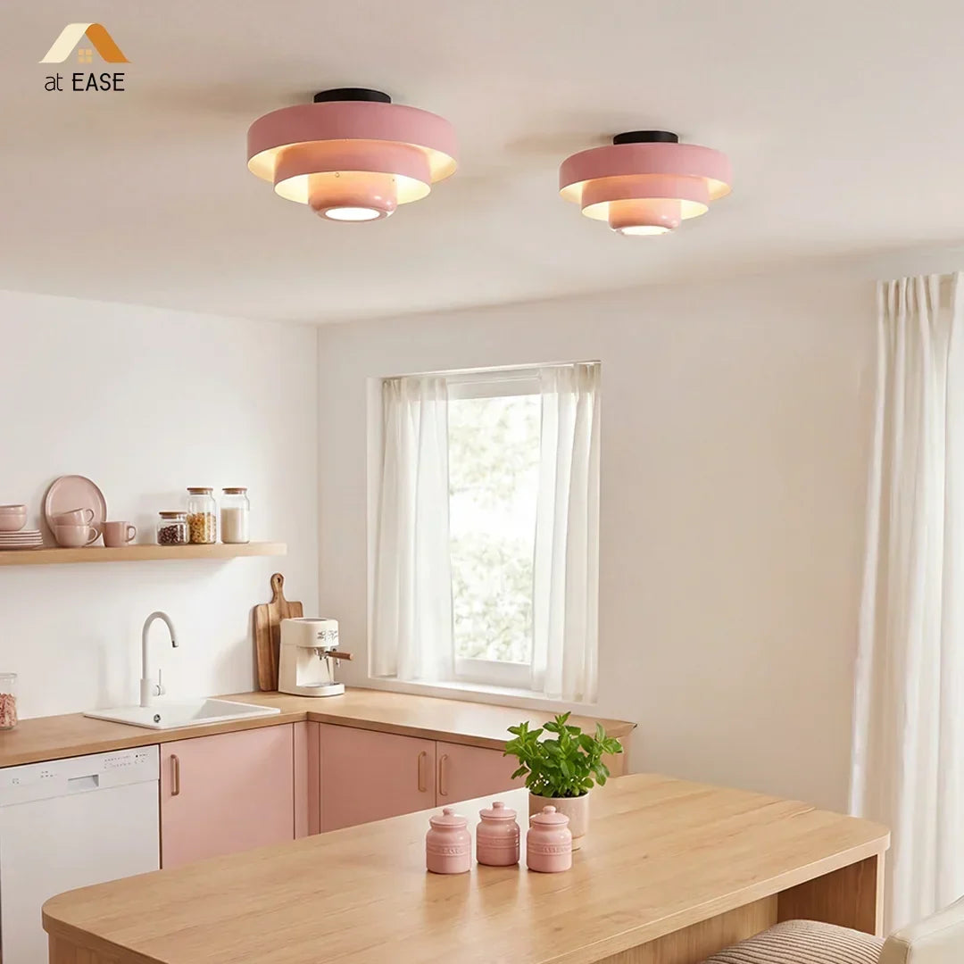 Artistic tiered macaron round ceiling light, colorful modern decorative fixture.