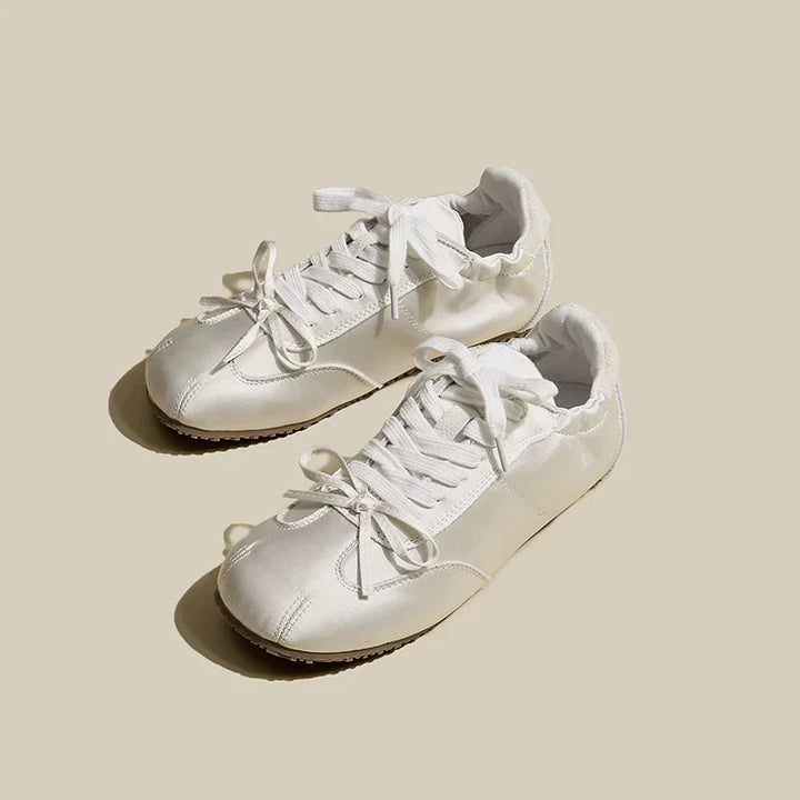 Comfortable women's low-profile sneakers, perfect for adding a touch of chic to any casual outfit.