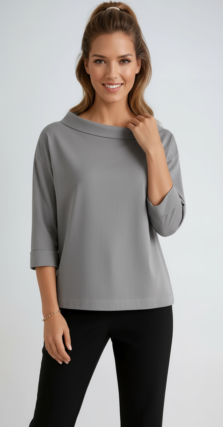 Versatile women's 3/4 sleeve boat neck top, relaxed fit. Offers an elegant, comfortable look for office or casual.