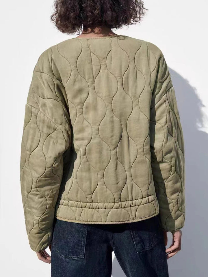 Women's warm quilted jacket, perfect for effortless autumn layering. Vintage style, ideal casual fall outerwear.