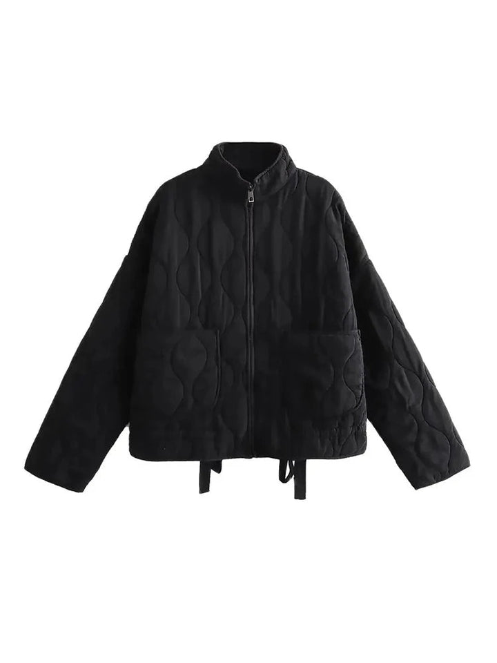 Stylish women's vintage quilted jacket. A versatile layering piece for effortless autumn and winter fashion.