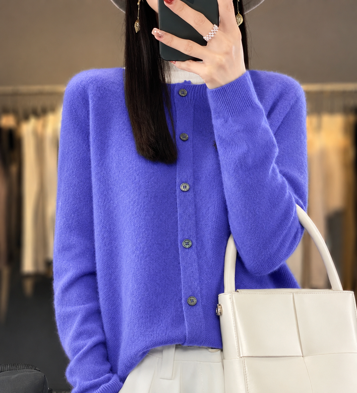 Close-up of elegant women's button-front knit cardigan, perfect for versatile layering.
