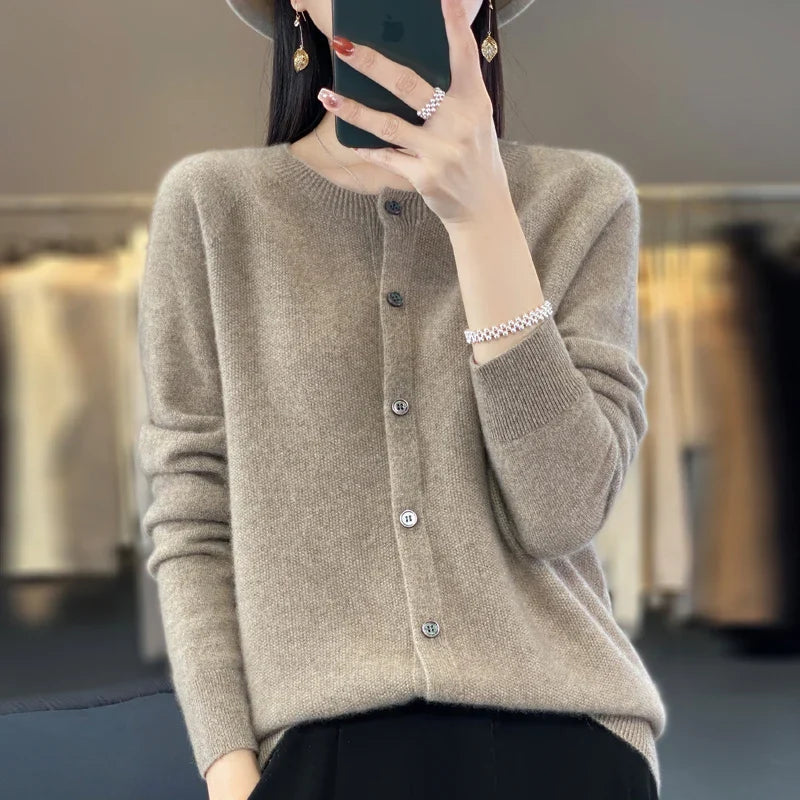 Full shot of a women's elegant button-front knit cardigan, a versatile long-sleeve piece for chic layering.