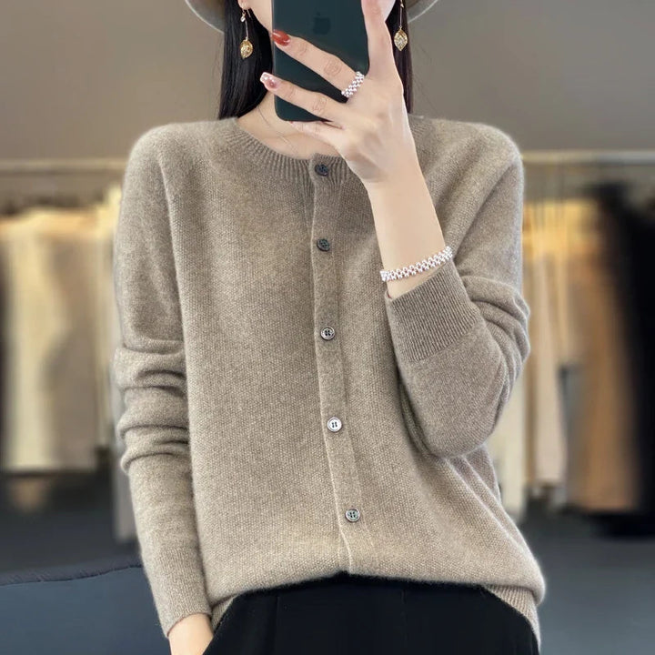 Full shot of a women's elegant button-front knit cardigan, a versatile long-sleeve piece for chic layering.