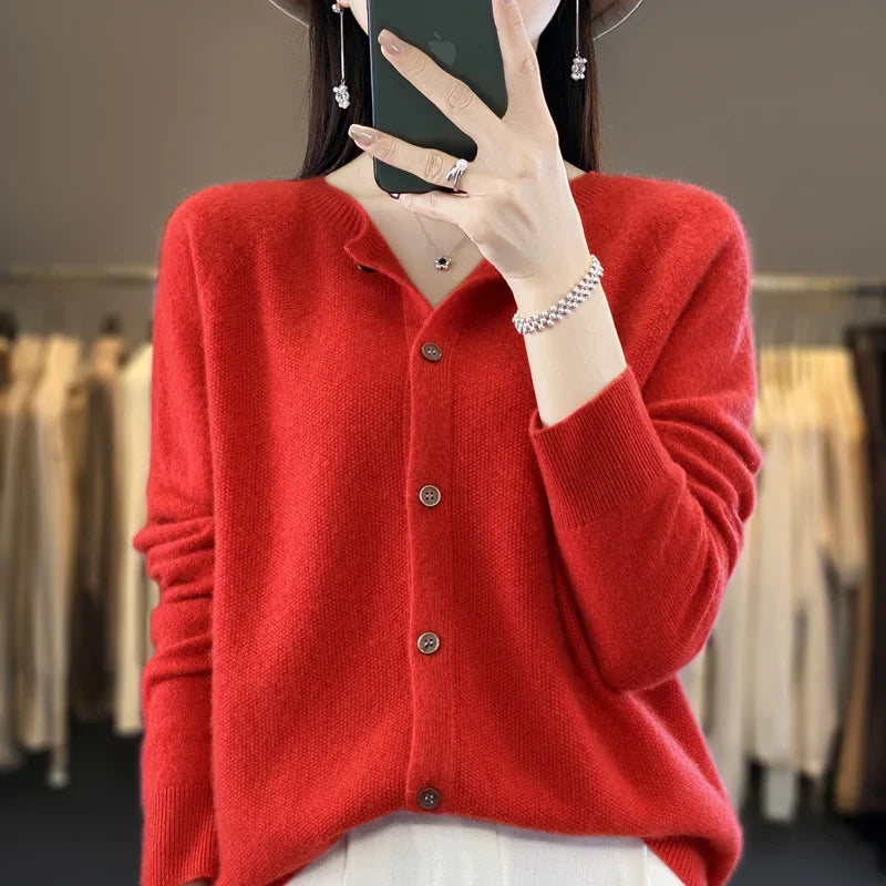 Soft women's knit cardigan with elegant button front. A comfortable, all-season layering essential.