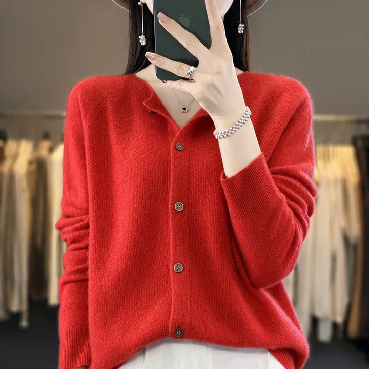 Soft women's knit cardigan with elegant button front. A comfortable, all-season layering essential.