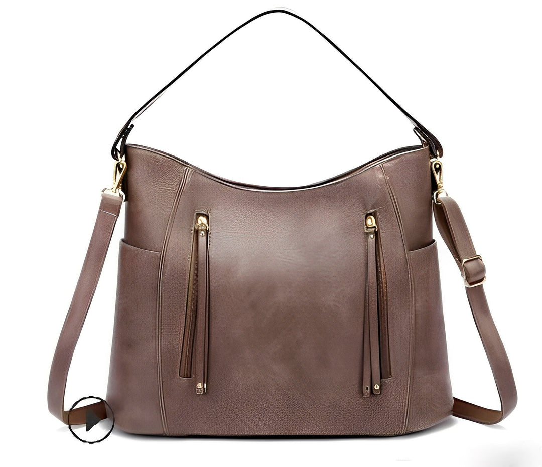 Classic black genuine leather vintage handbag. Women's durable shoulder & crossbody bag, elegant everyday accessory.