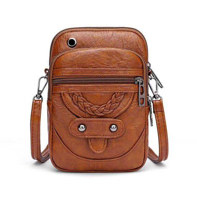 Durable genuine leather women's crossbody bag, a stylish vintage accessory perfect for everyday elegance.
