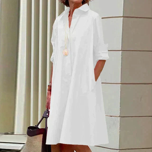 Minimalist women's everyday relaxed fit dress with pockets, perfect for casual spring/summer outfits.