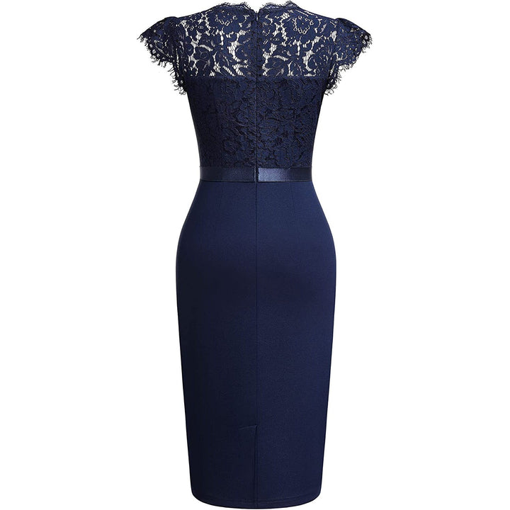 Sophisticated women's formal short sleeve dress, designed for wedding guests & elegant evening wear.