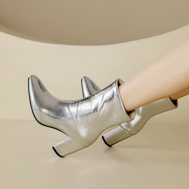 Comfortable women's silver ankle boots with a modern, elegant design. Stylish & versatile footwear for everyday casual to formal wear.