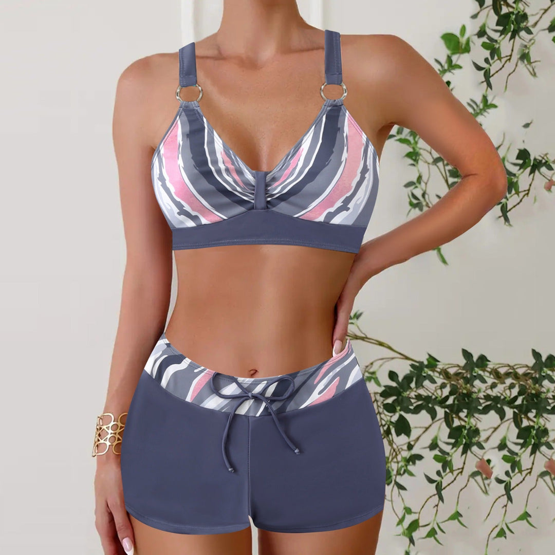 Coastal-inspired women's two-piece swim set, nautical stripes, perfect for beachwear.