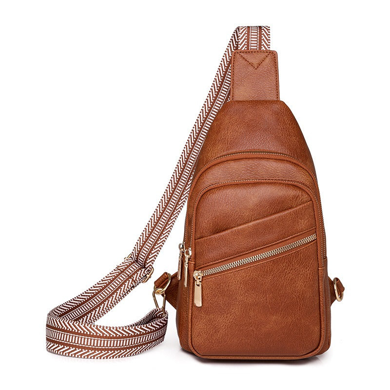 Chic women's modern sling bag in a versatile color, perfect as an everyday crossbody purse or hands-free shoulder bag.