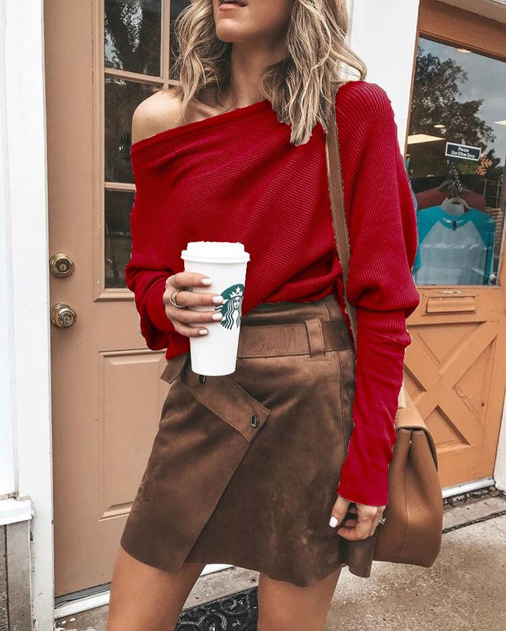 Fashionable women's off-shoulder sweater. Elegant loose fit pullover, perfect for casual chic style & comfort.