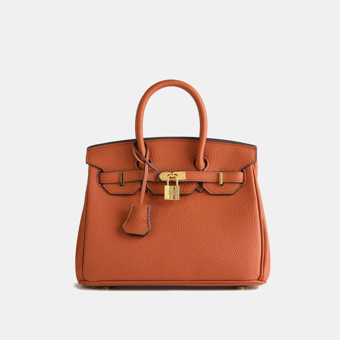 Stylish women's embossed leather shoulder bag, ideal for elegant day-to-night looks.