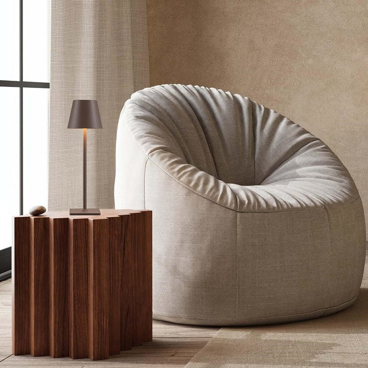 Sleek dimmable LED table lamp, perfect as a bedroom or outdoor accent.