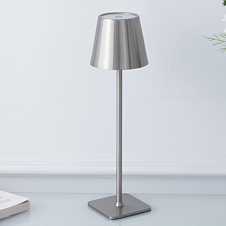 Tall LED table lamp, dimmable and rechargeable, suitable for any modern setting.