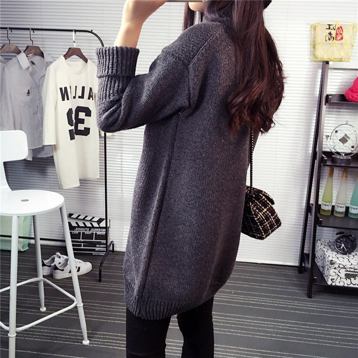 Comfortable women's relaxed fit turtleneck tunic dress with long sleeves, ideal casual wear for fall & winter.