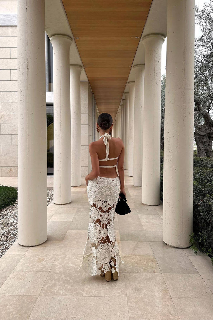Chic white cut out maxi dress for women, an ideal choice for summer parties and beach resort style.