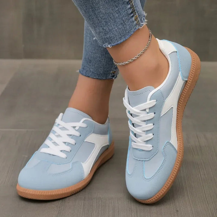 Retro Sydney Varsity Arc women's sneakers, classic athletic style. Ideal for comfortable everyday wear & urban fashion.