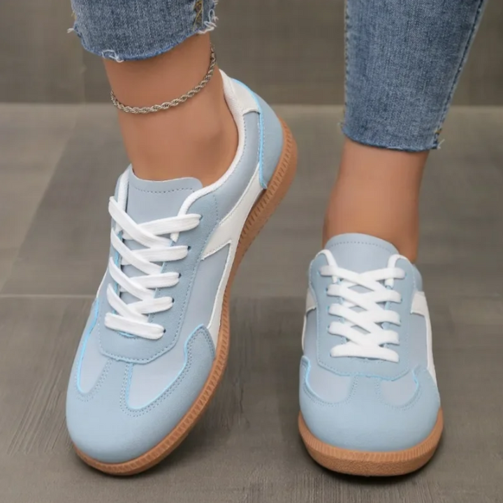 Versatile women's Sydney Varsity Arc sneakers, blending retro sporty flair with modern casual comfort. Great for daily wear.