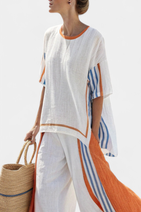 Stylish women's wide-leg pant set with multi-color stripes, offering a comfortable and relaxed fit.