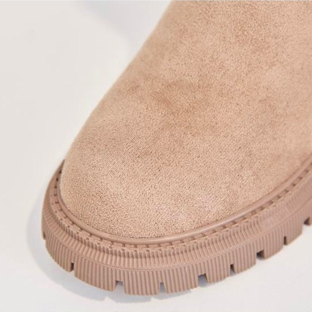 Women's water-resistant winter boots, warm and cozy with orthopedic arch support for comfort.