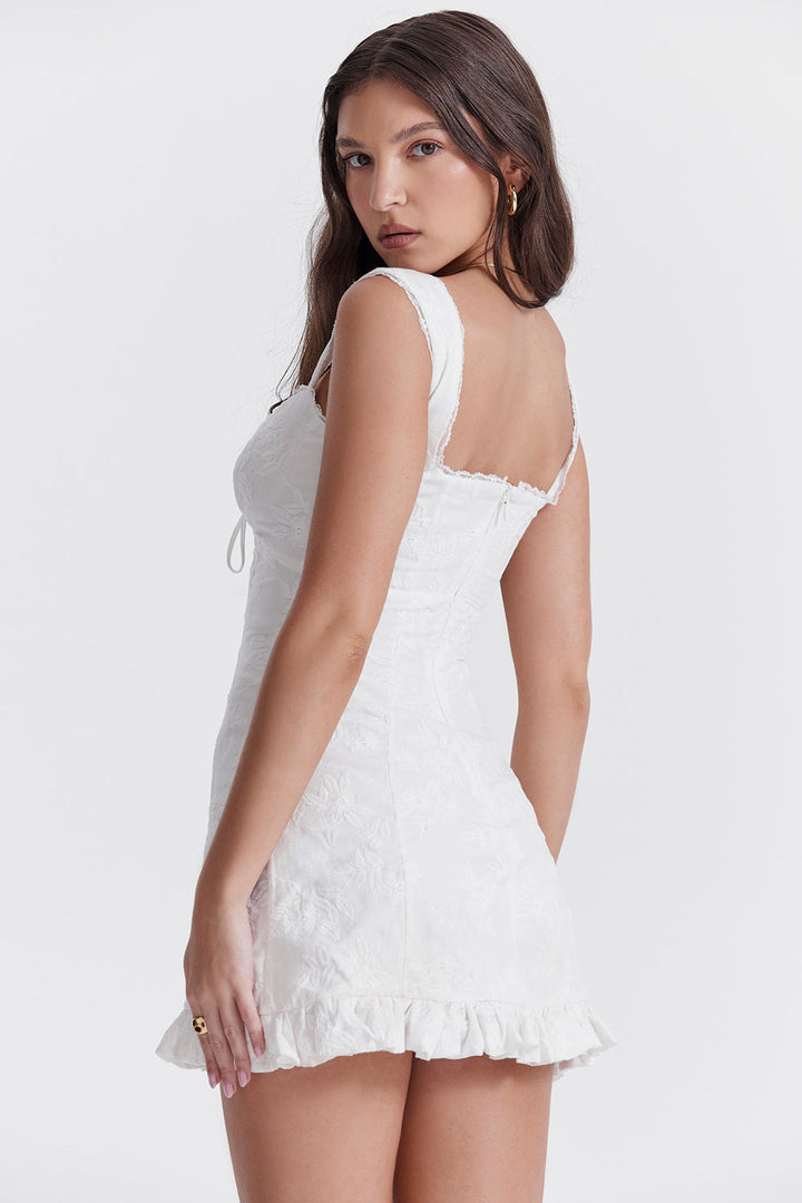 Versatile white mini dress with a tie waist, suitable as a summer party, vacation, or casual women's dress.