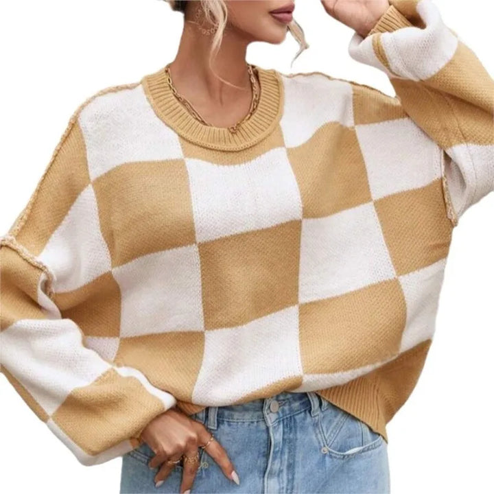 Oversized women's sweater, checkerboard design, soft knitted fabric, great for daily wear.