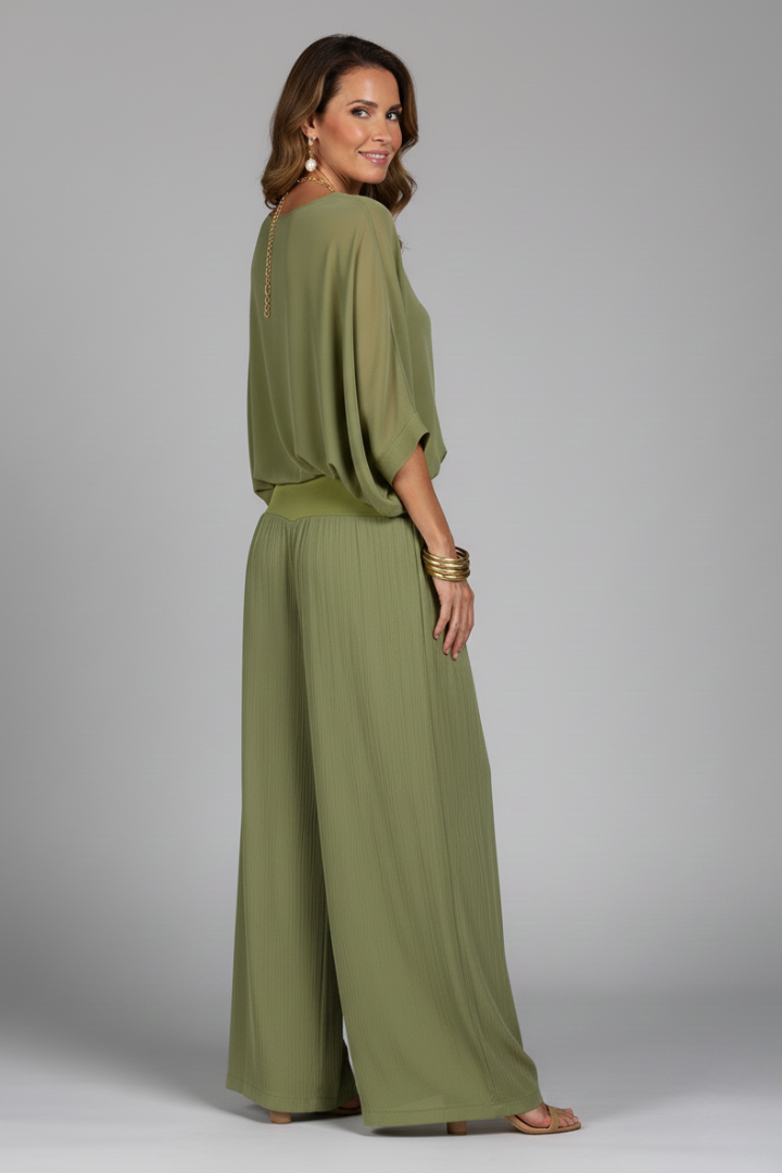 Effortless women's two piece chiffon set with a relaxed fit and stylish wide leg pants design.