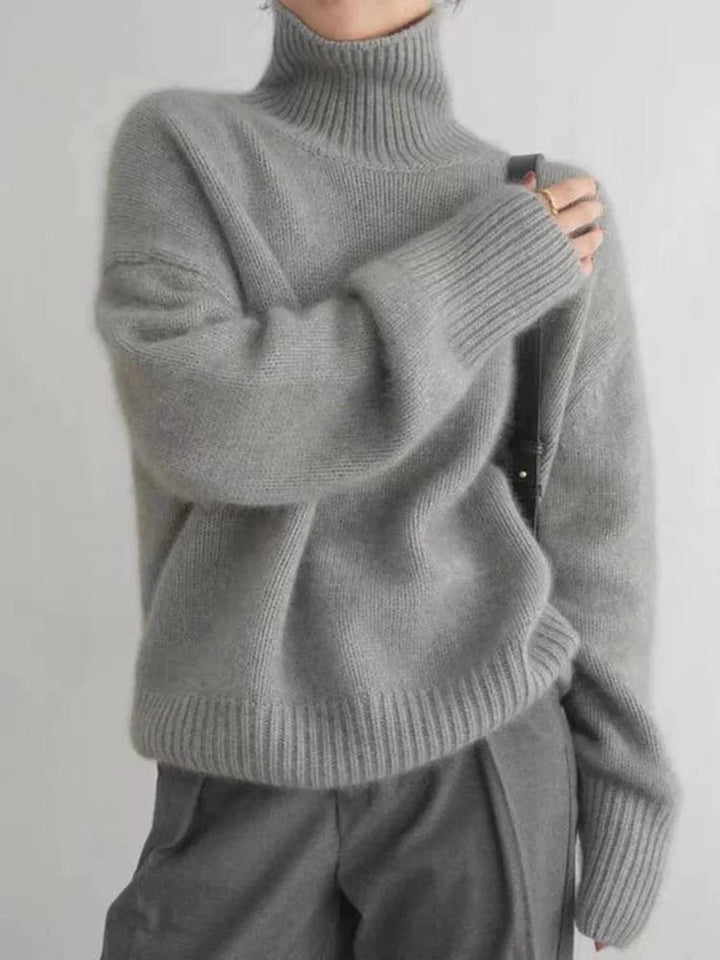 Warm women's knit turtleneck sweater for winter, ideal for chilly weather & casual everyday style.