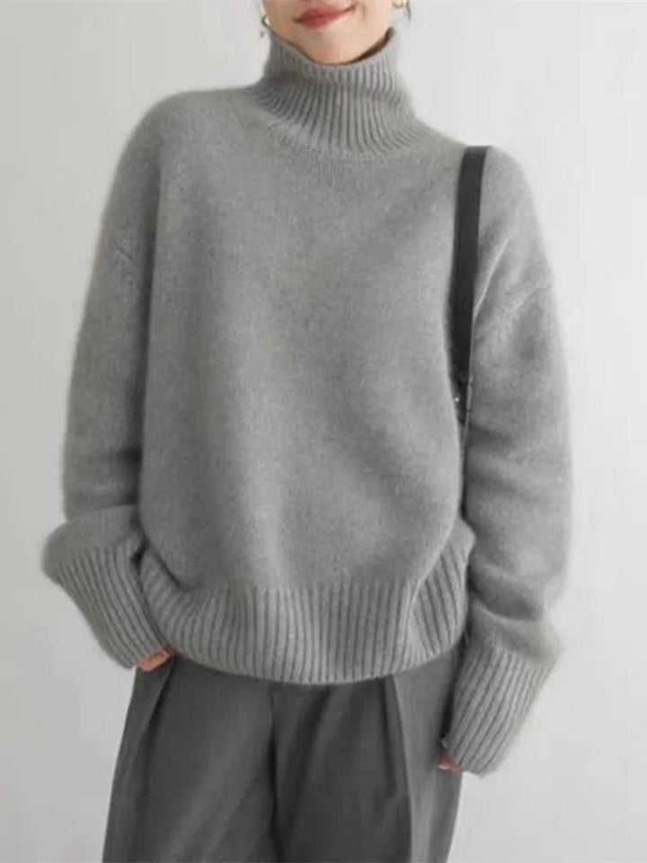 Effortlessly stylish women's cozy turtleneck sweater, a must-have for comfortable winter fashion.
