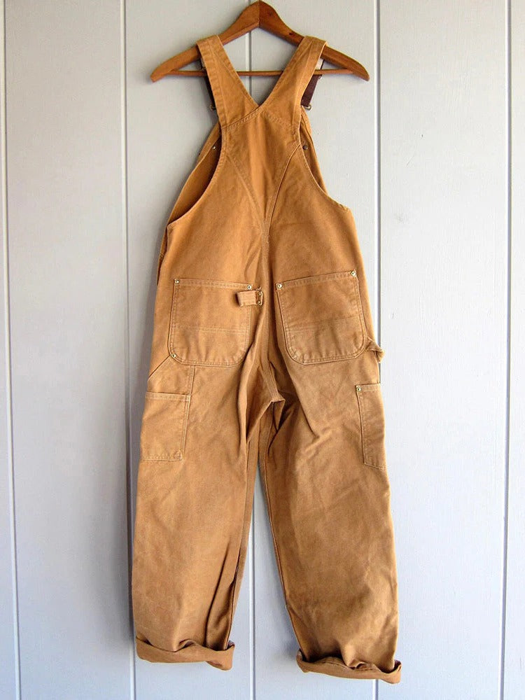 Green wide leg overalls for women, offering a comfortable, relaxed fit and chic everyday style.