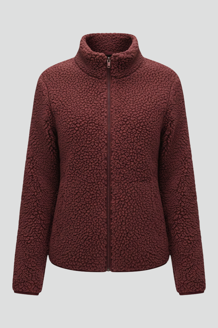 Soft fleece women's zip jacket with stand-up collar for cozy warmth and stylish layering.