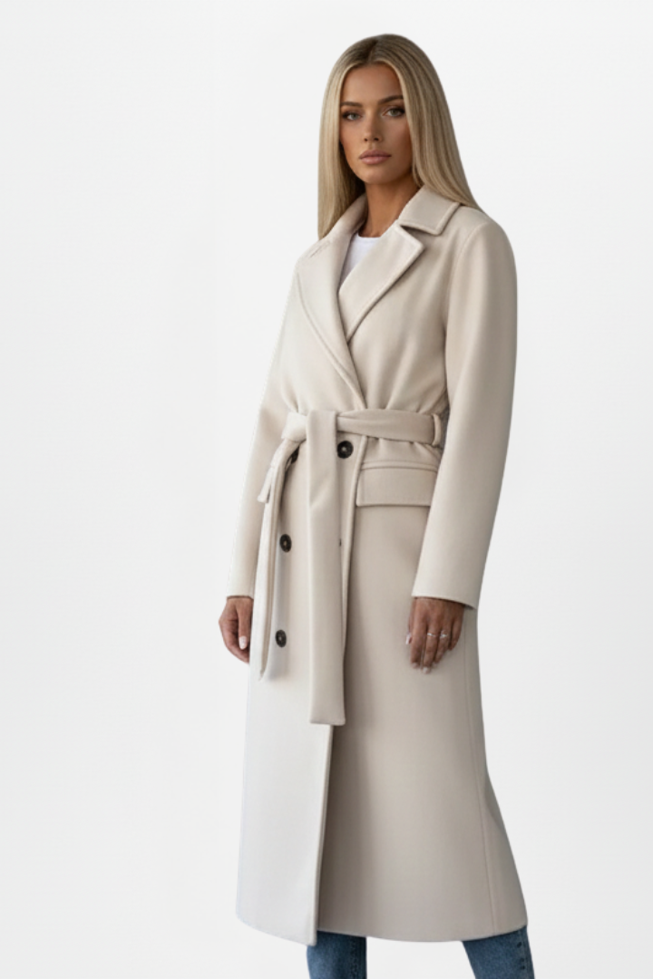 Sophisticated women's belted trench coat, a long fall winter outerwear staple for classic women's fashion.