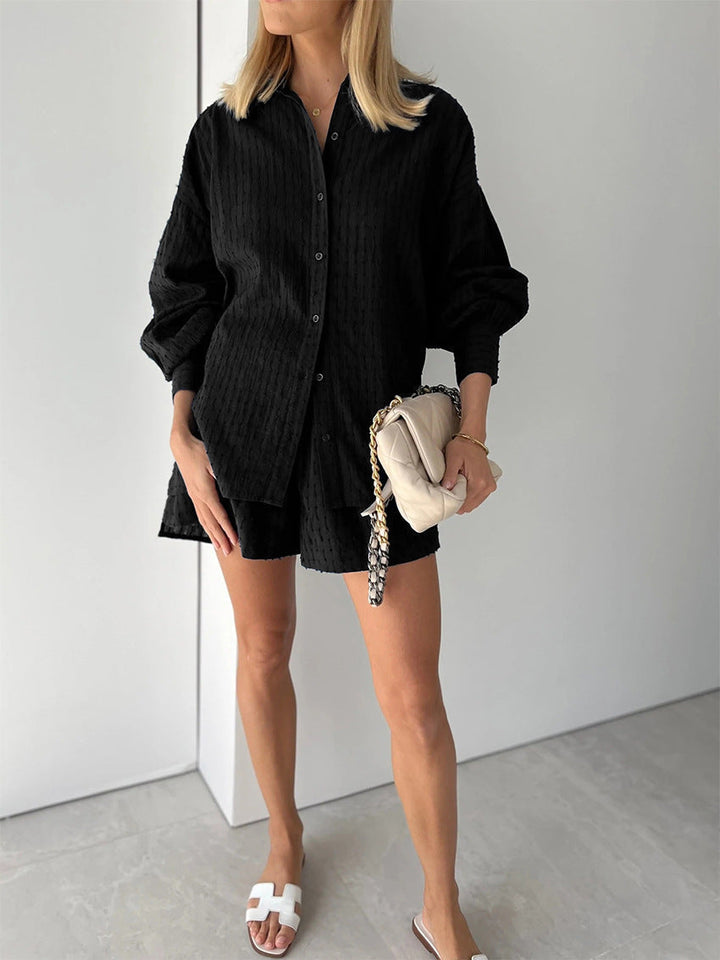 Chic women's co-ord set featuring a relaxed fit button-up shirt and flowy shorts, an essential for summer fashion.