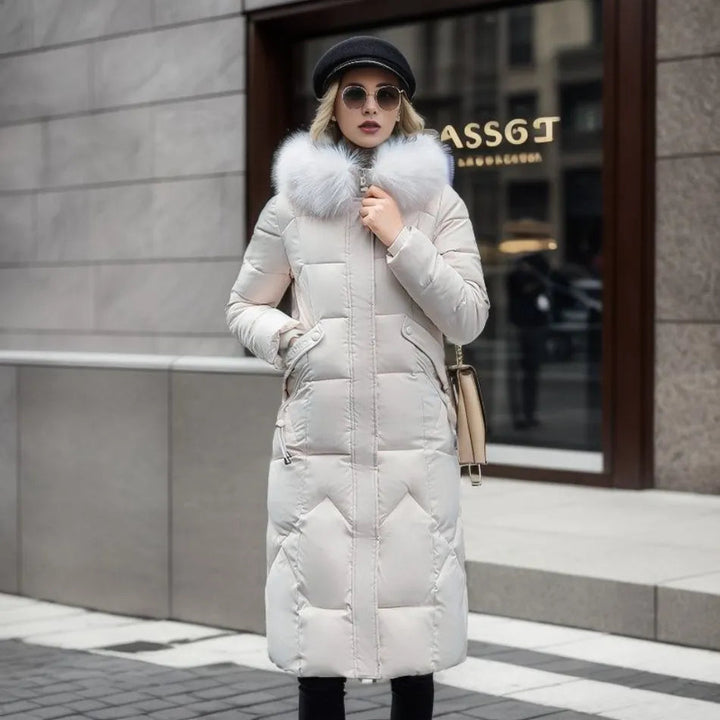 Close-up of chic women's quilted winter coat, highlighting detailed stitching & warm texture.