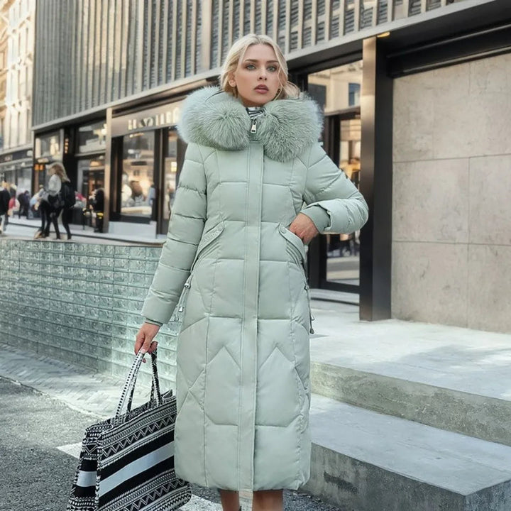 Full-length shot of a women's quilted hooded winter coat, combining warmth, style, and comfort.